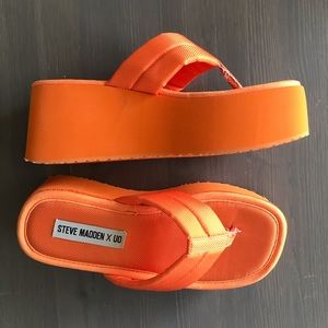 orange platform flip flops